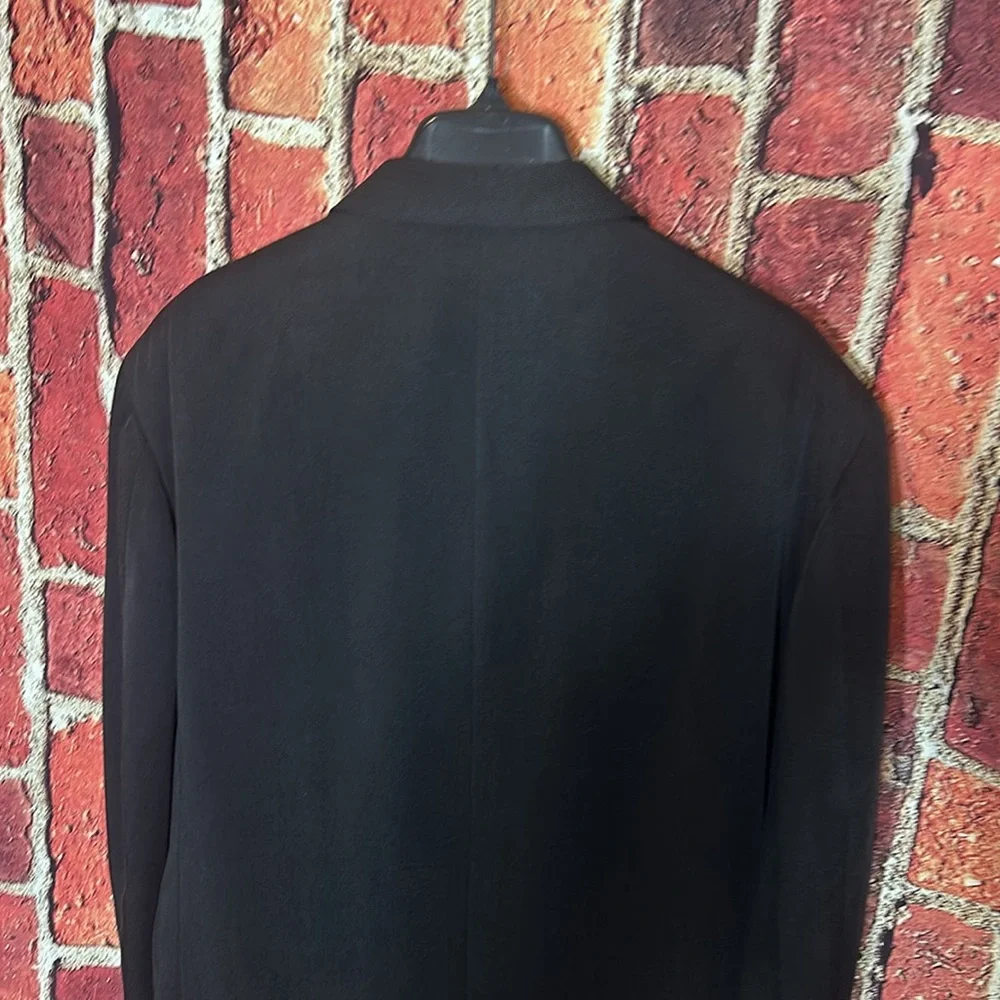 Oscar de la Renta used excellent